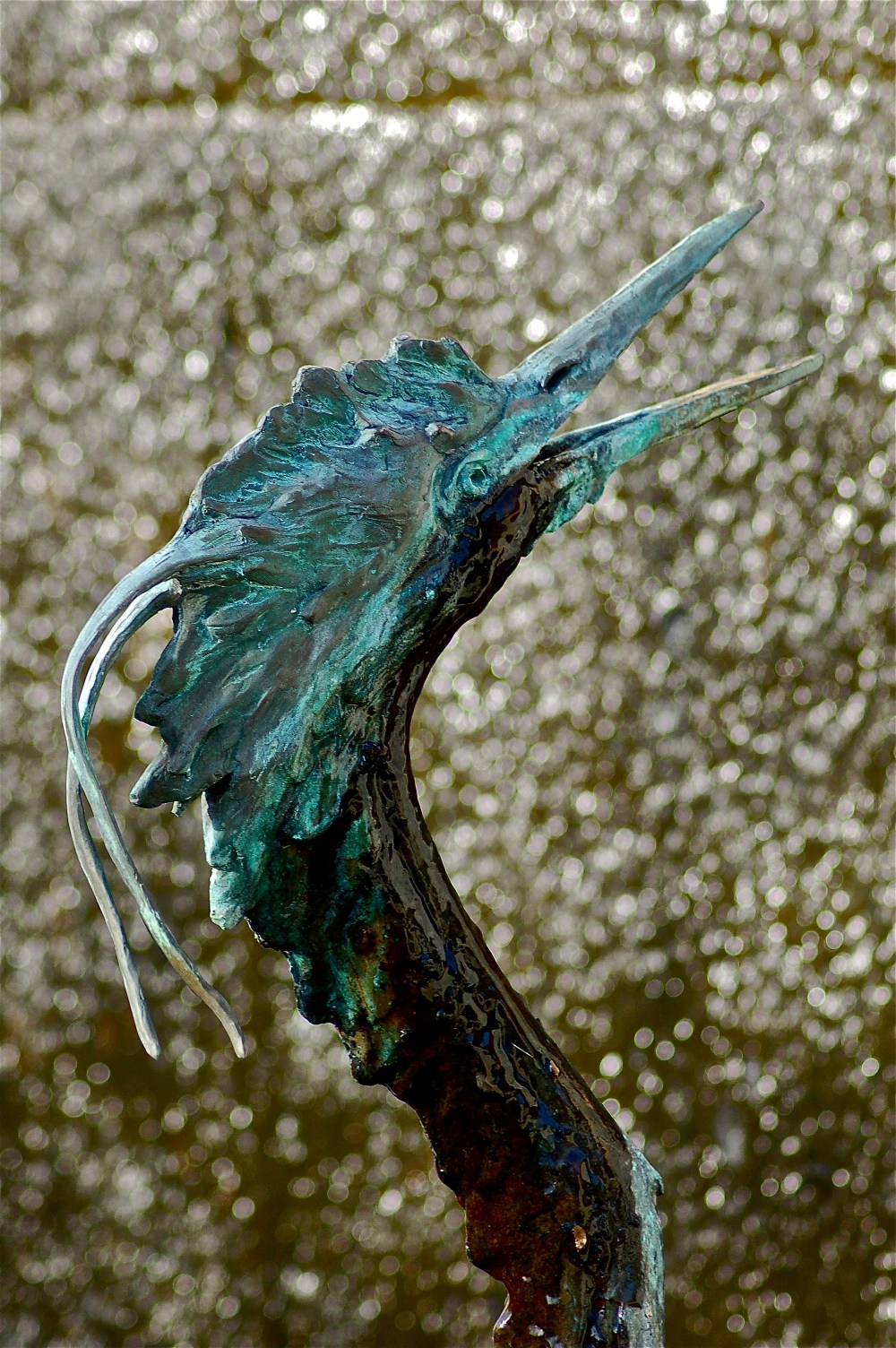 The fountain behind the bird froze one shockingly cold Alabama night