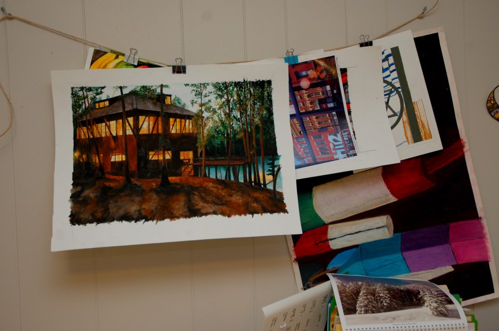 some of my art on the one the wire, most are watercolor, those wooden things are pastel