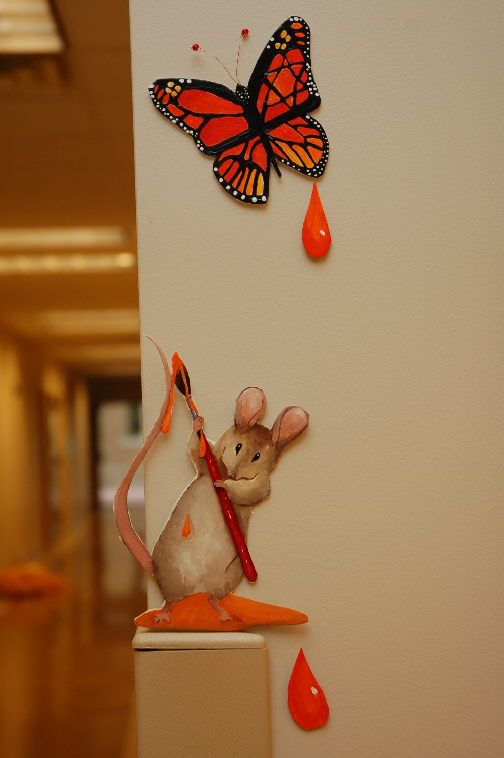 I painted this little mouse & Monarch butterfly for the preschool I worked for.