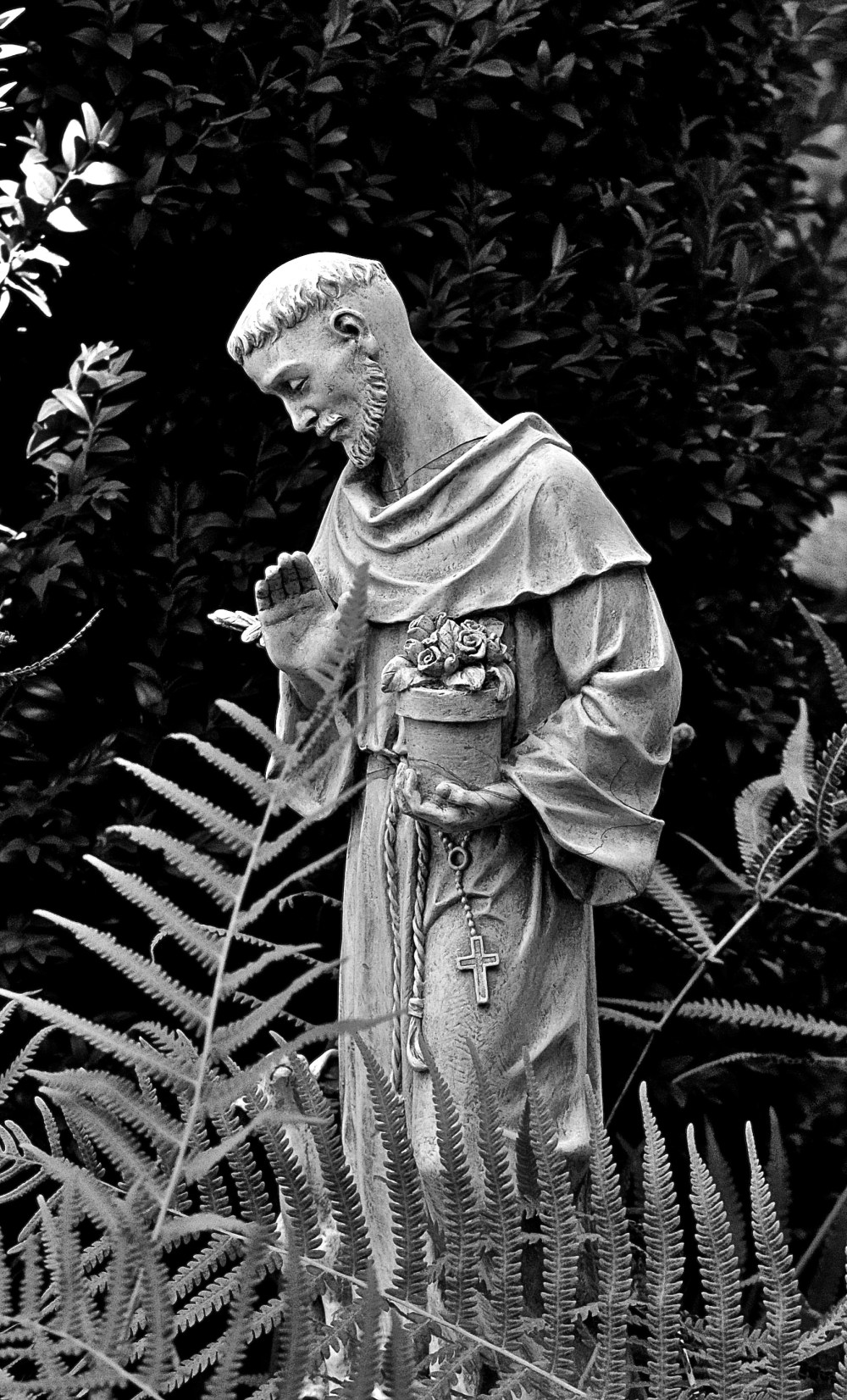 St. Francis holding a pot of flowers (favorites) & a bird (one of my favorites)