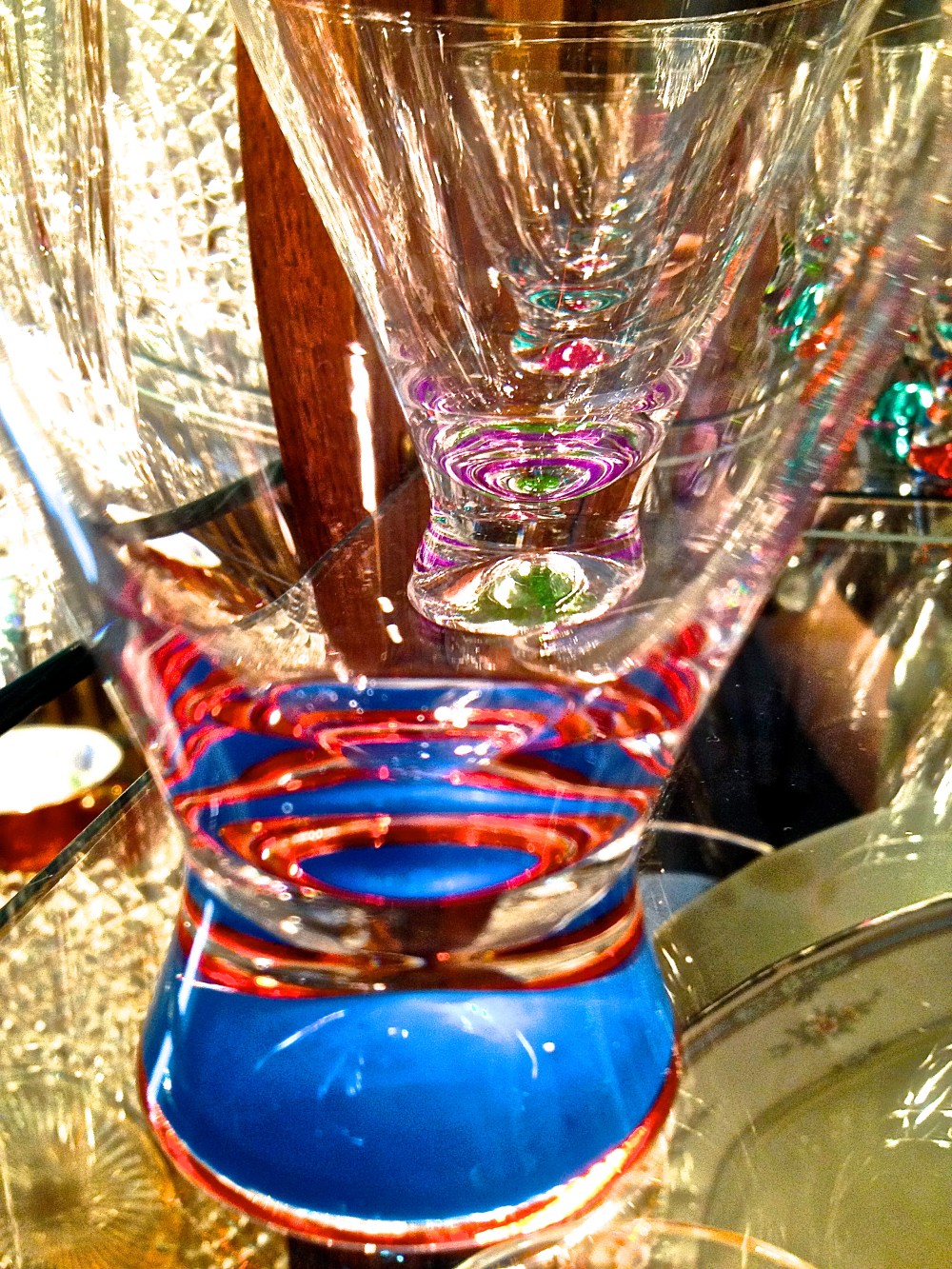 Playing with some of  mom's drinking glasses, iPhone pix