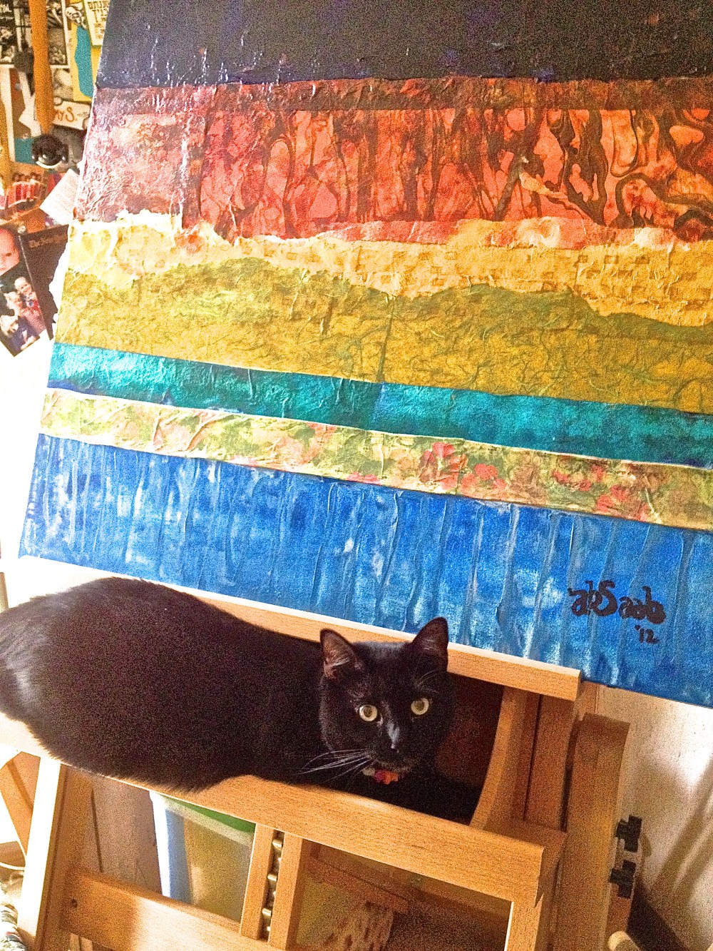 Ivy on my easel, I wonder if she wants to paint.