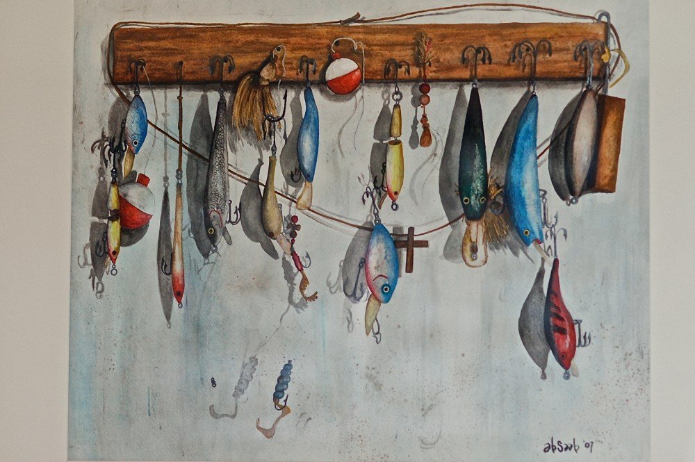 The lures hung from my lamp desk