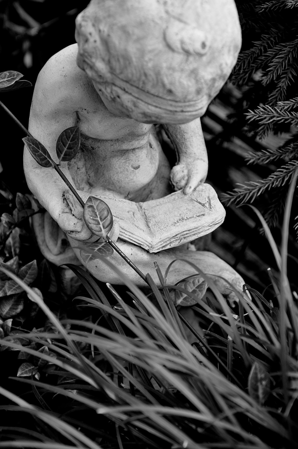 strange naked cement garden art