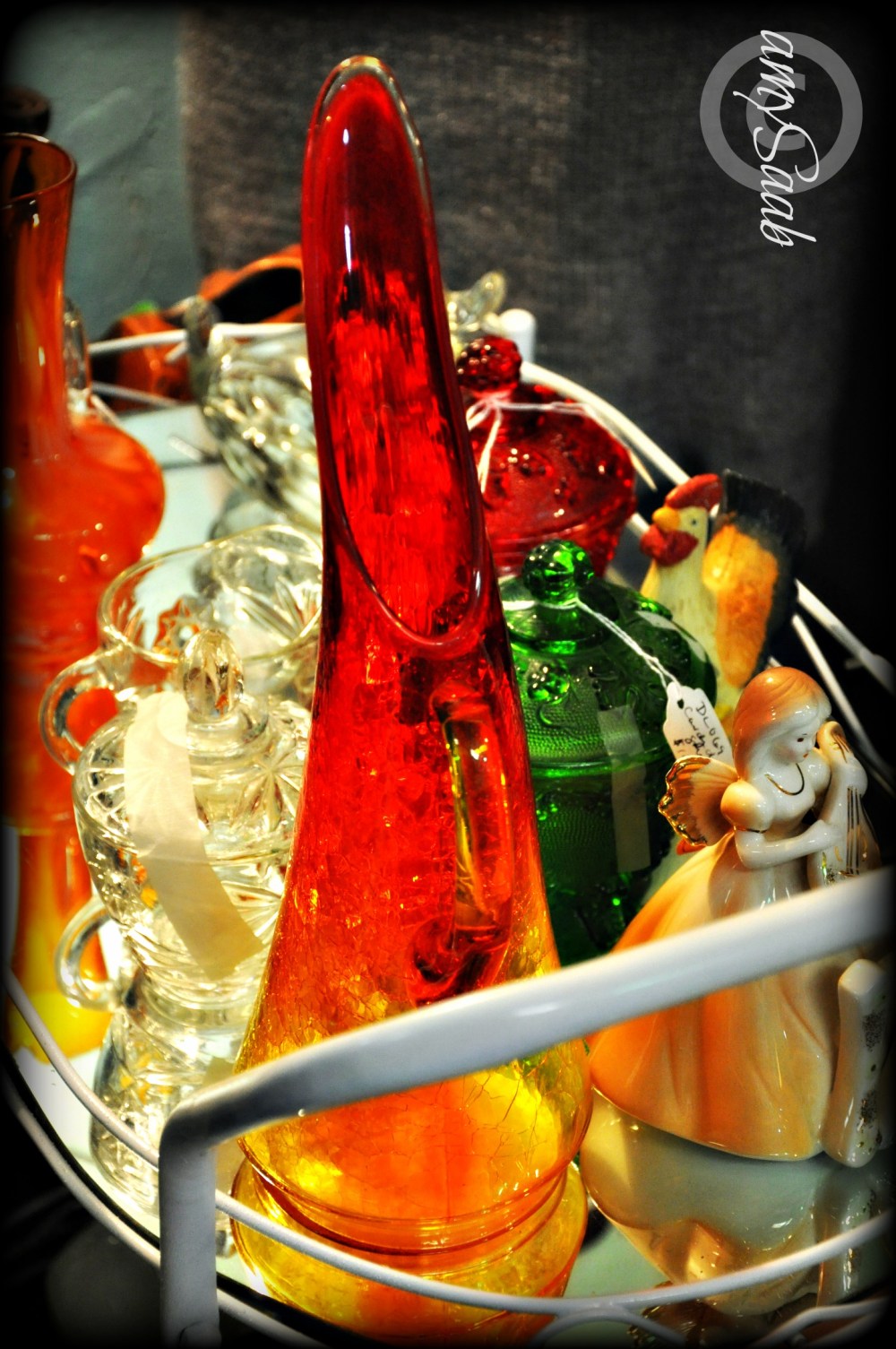 on top of the mirror sat a rainbow of color