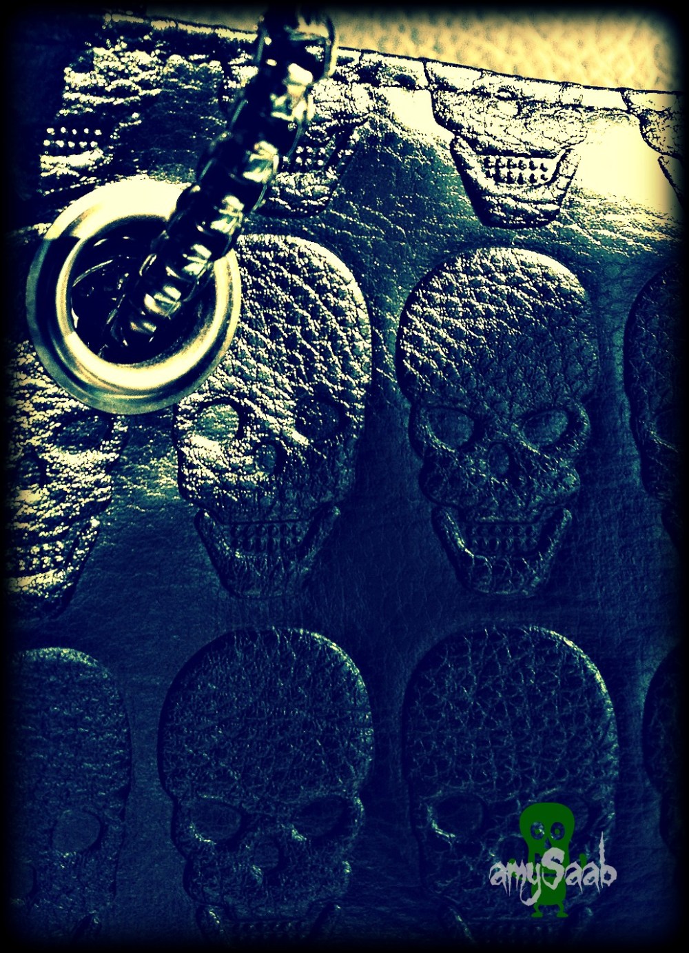 Scull purse & Porsche owner