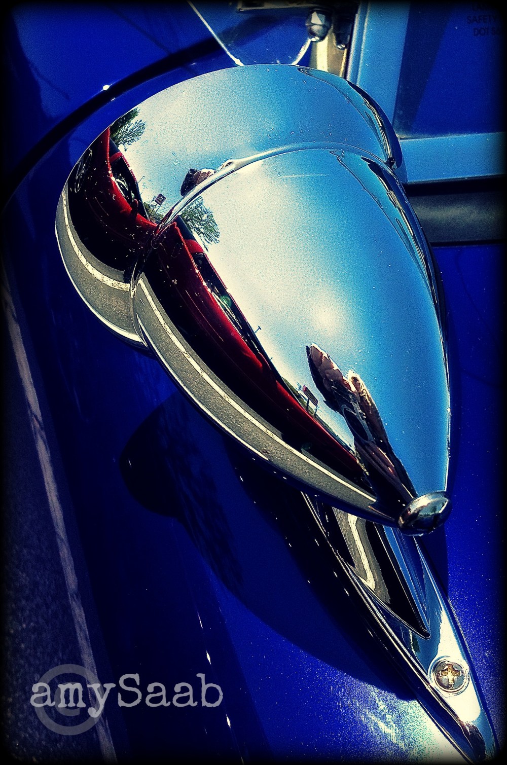 side view mirror surrounded in Blue