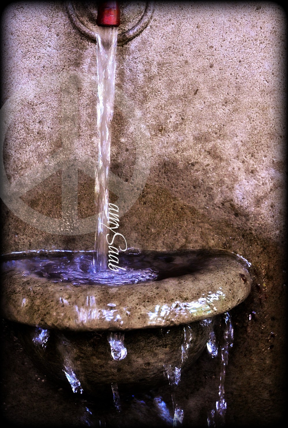 cool fountain surrounded by junk