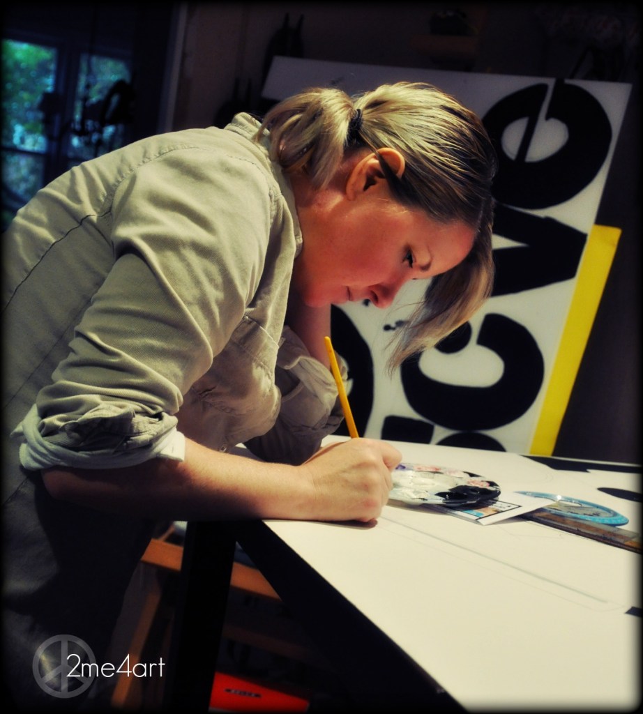 me.  Making letters, photographed by my son.