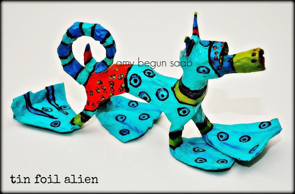 made of tin foil, tape, white paint & then acrylic…a lot of fun for kids in my art class