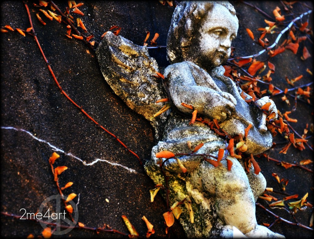 an angel wrapped up in ivy