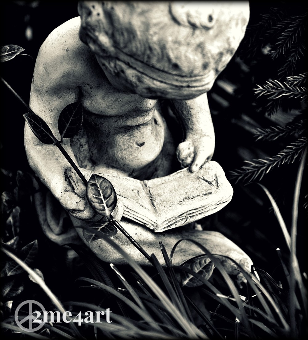 naked & in the garden reading a book