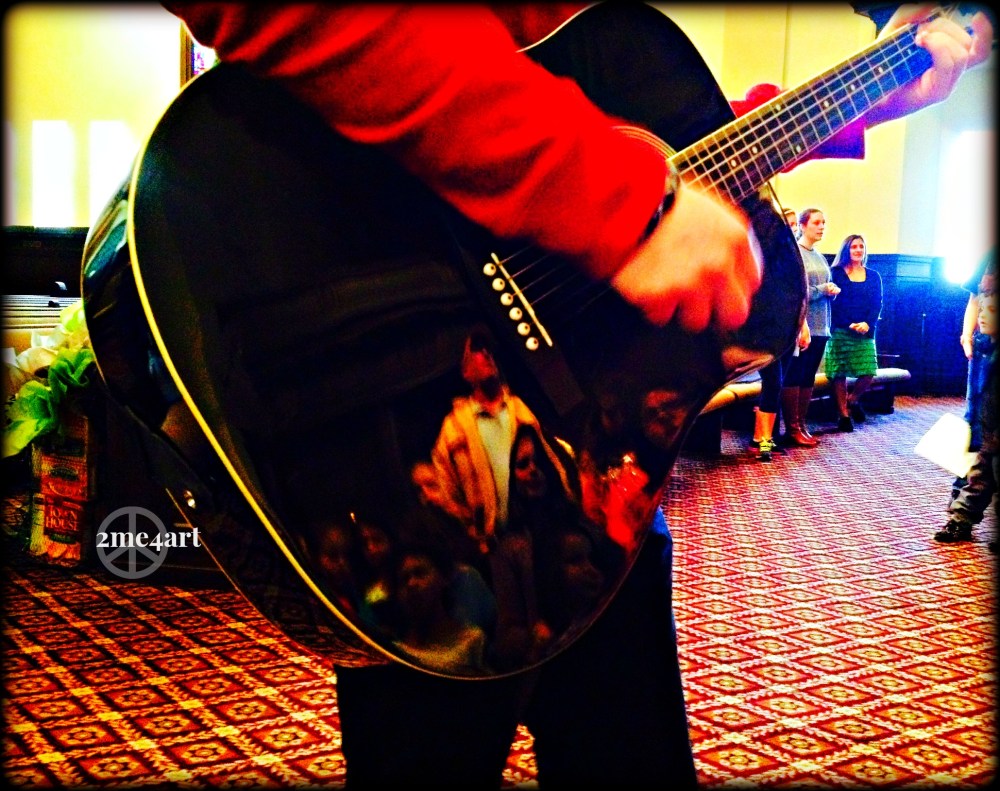 The kids were singing at the top of their voice.  It had been a while since they had all gathered for Sunday School at Temple. This Sunday, the parents were invited to attend too, which is why I was there too. The Rabbi had the kids sit on the Bima (stage) & lead the morning service, instead of our Cantor & Rabbi .  My only regret was that I had not brought my camera. iphone picture