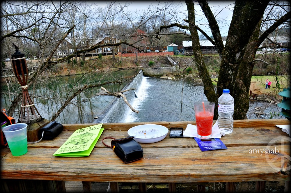 this was not my seat, I asked to take a photo between two women before I was seated close beside them. Fruity drinks & cigarettes with this view. I'll bet they had a great day. 